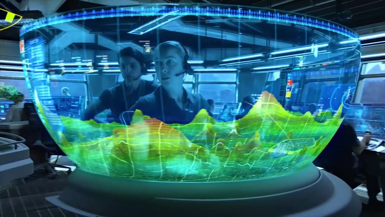 A luminous three-dimensional tactical interface in Avatar’s control room.