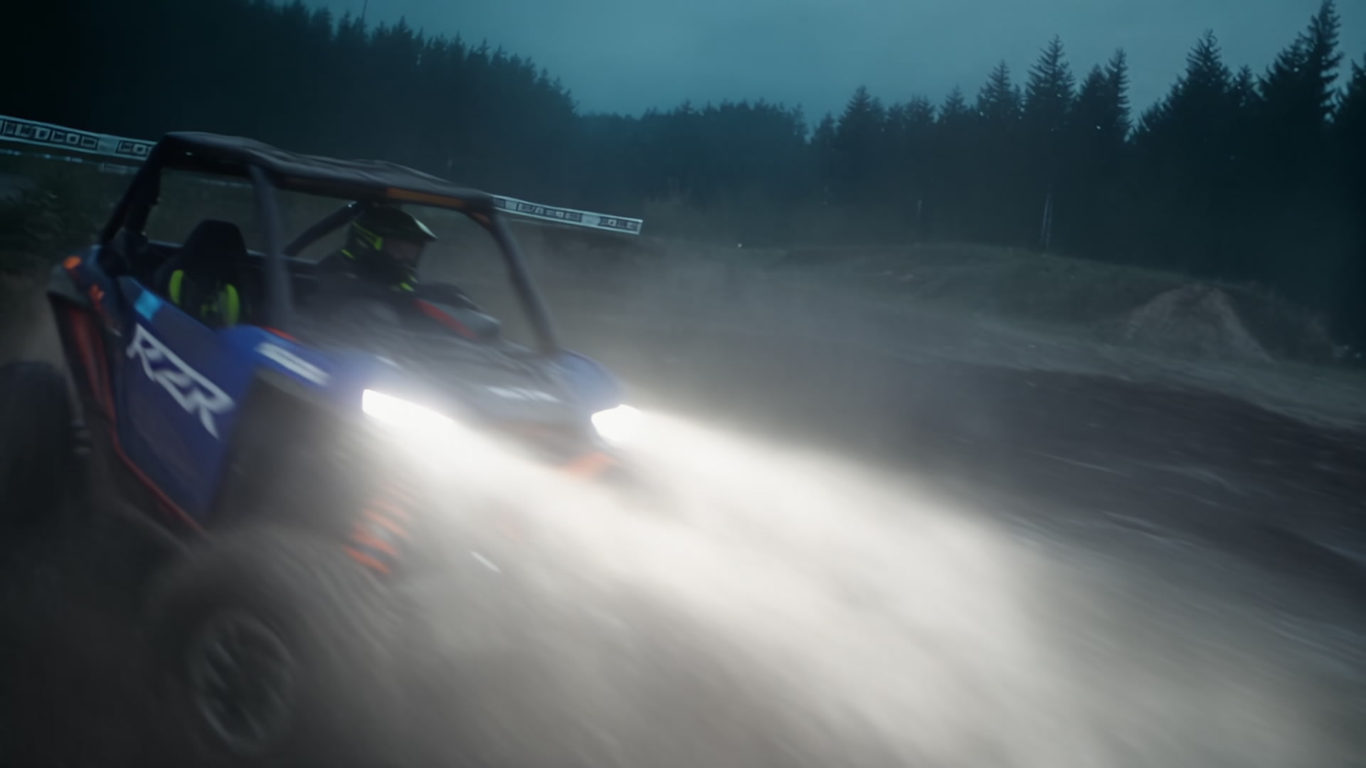 2026 revision: A vehicle passing through mud and headlight glare